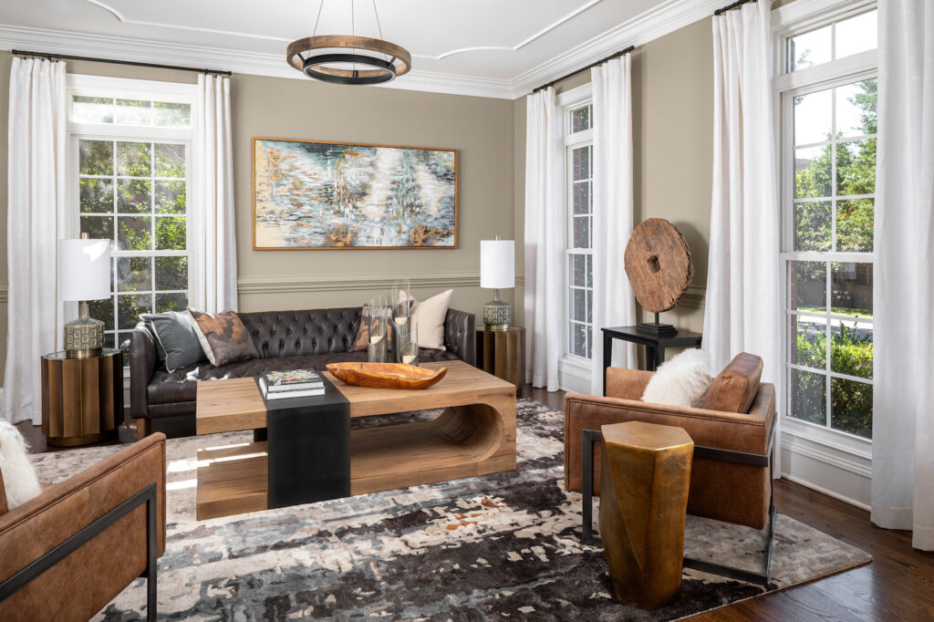 modern formal living room with Uttermost art and decorative accessories